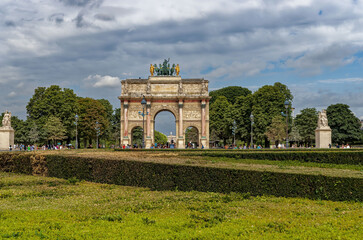 Fototapeta na wymiar Arc De Triumphs The Carousel And Garden Tuileries, Ile De France, France