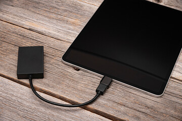 Memory card or external hard drive is connected to the Tablet PC.