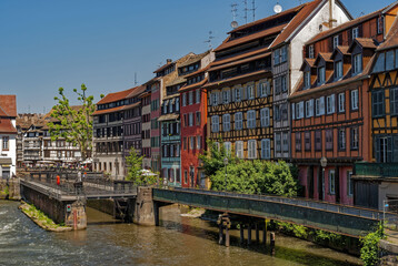 Fototapeta na wymiar Colorful Half Timbered Along The Ill In The District Petite France Strasbourg, Alsace, France