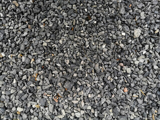 Abstract background with pebbles small round sea stones Beach rocks Texture material nature, Rock the specifics, grey black color