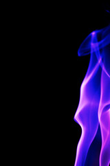 Abstract purple smoke on black background