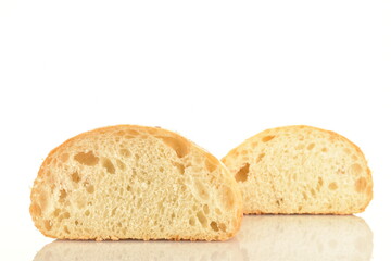Two halves of fresh aromatic ciabatta, close-up, isolated on white.