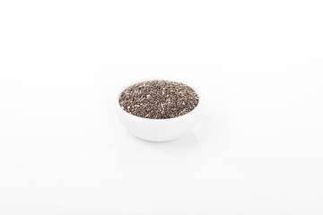Chia seeds. Chia seeds in white bowl on white background. chia