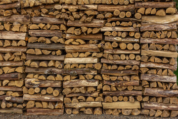 Woodpile seamless texture drying wood for fireplace 
