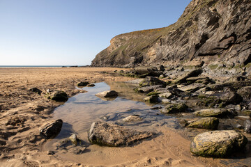 Fototapeta na wymiar Low tide at Mawgan Porth beach, North Cornwall, UK