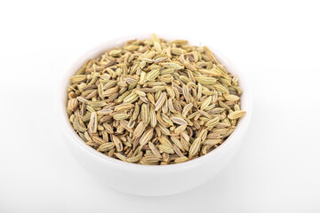 fennel seed. dry fennel seed in white bowl on white background. fennel