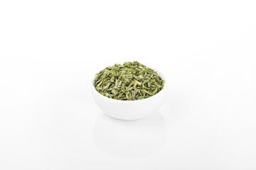 dry chopped spring onion  in white bowl on white background. dry chopped or scallion. dry green onion, chopped onion, chopped spring onion.