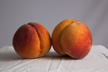 Two peaches together