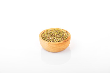 dry oregano. dry oregano spice in wooden bowl on white background. oregano, dry oregano