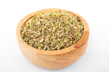 dry oregano. dry oregano spice in wooden bowl on white background. oregano, dry oregano