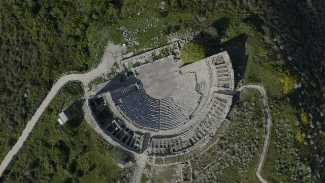 Ancient theater of Segesta partly excavated in the rock of the hill. Segesta Archaeological Park in the province of Trapani. Ancient Sicily.