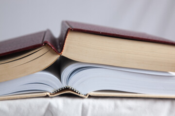 Two books stacked on top of each other