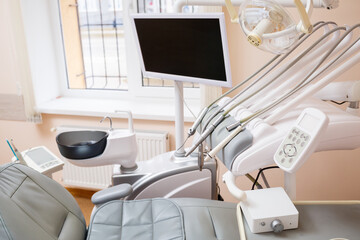 Dental treatment device for patients. The workplace of a professional dentist. Healthy teeth. Dental office with nobody in