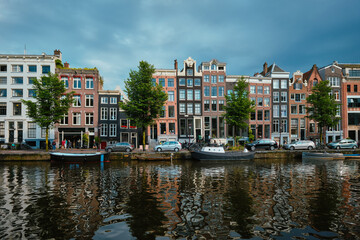 Fototapeta na wymiar Singel canal in Amsterdam with houses. Amsterdam, Netherlands