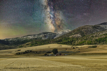 Milky Way over a mountain field