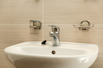 Bathroom with brown tiles