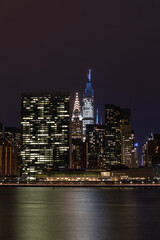 Fototapeta na wymiar Nighttime Midtown Manhattan Skyline along the East River in New York City