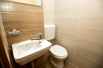 Bathroom with brown tiles
