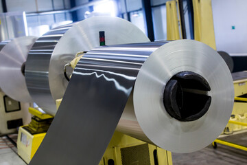 Aluminium coil and sheet on machinery - obrazy, fototapety, plakaty