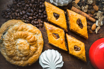 Delicious traditional turkish food baklava with honey and nuts. Oriental sweets with pistachio....