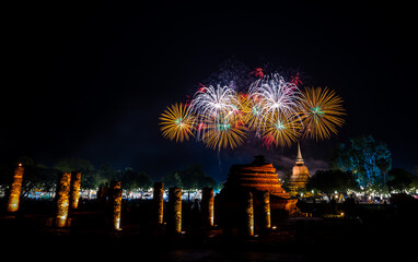 Firework of Loy Krathong festival showing in Sukhothai historical park. Sukhothai, Thailand.