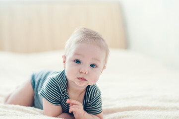 A man in a barbershop washes his head.
