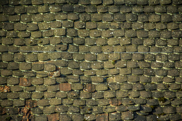 Old weathered tiles on a roof