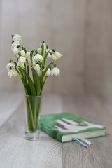 White flower, wooden light background