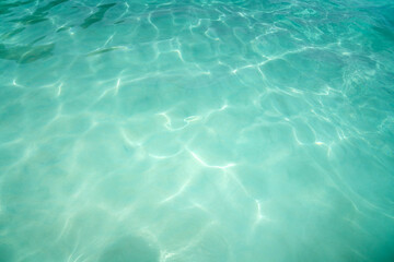 Top view of sea or ocean. Surface of salt water. Reflection of light on the surface of water. Relaxation and comfortable concept. Holiday and vacation in summer season