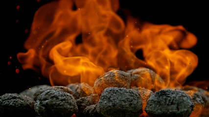 Charcoal briquettes ready for barbecue grill.