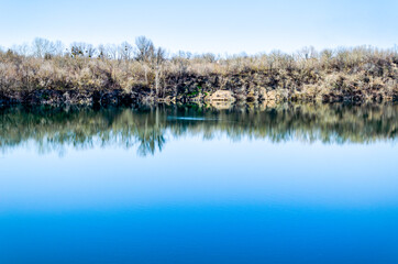 Smilansky sand quarry with lake in spring