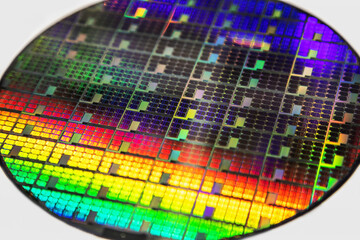 Silicon wafer with shimmers chips with different colors for microelectronic devices.