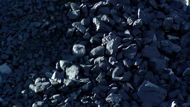 Coal Chunks Falling at Coal Mine in Rio Turbio, Santa Cruz Province, Argentina. 