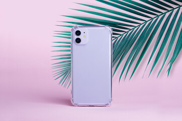 Purple iPhone 11 isolated on a pink background with palm leaves, clear phone case mockup, iPhone 12...
