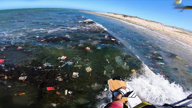 Freestyle kitesurfing on Son Hai,Vietnam coast contaminated by plastic rubbish