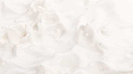 Splashing milk on white background