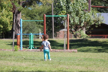 child playing in the playground