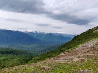 Kamchatka Mountains. Mountains covered with grass. The volcanic ring.
