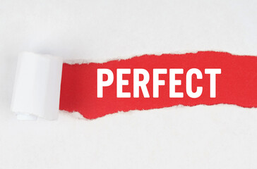 Behind torn white paper on a red background, the text - PERFECT