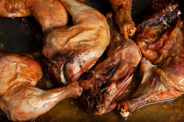 top view close-up of roasted chicken legs. Concept homemade food.