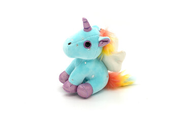 Blue unicorn plush toy. Isolated on white background