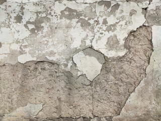 Grey Concrete Texture old wall with peeling paint, scratches and cracks