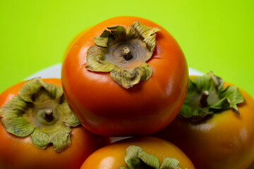 persimmon fruit on the table