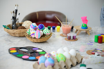 Fototapeta na wymiar young family people making easter egg in holiday at home, decoration background, spring colours rabbit tradition, children happy celebration art creative design with easter day