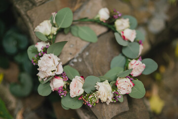Beautiful modern bridal flower crown of colorful fresh flowers. Modern wedding traditional...