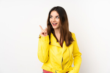 Young caucasian woman isolated on white background thinking an idea pointing the finger up