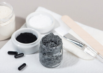 Ingredients for a homemade charcoal facial mask.