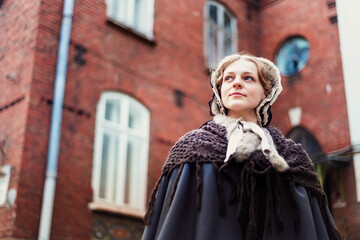 Young woman in vintage dress late 19th century 