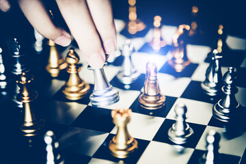Chess board game to represent the business strategy with competition in the world market. and find out the best solution to meet target objective and goal. Sign and symbol of challenging as concept.