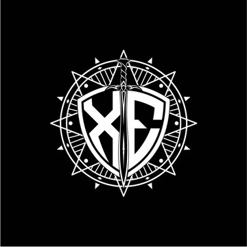 recommend clip art: monogram initial letter XE with shield decorated with star ornament